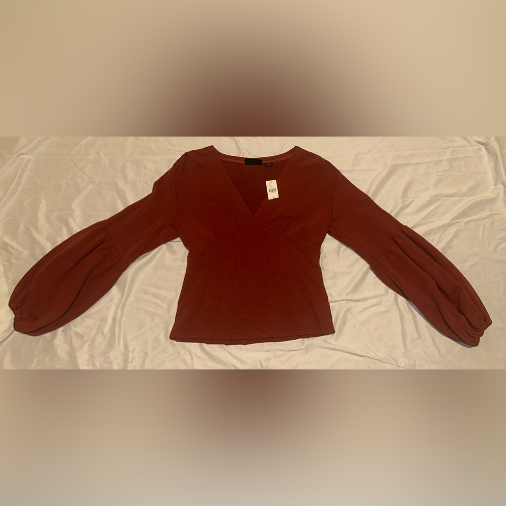 Red sweater with bishop sleeves, new with tags